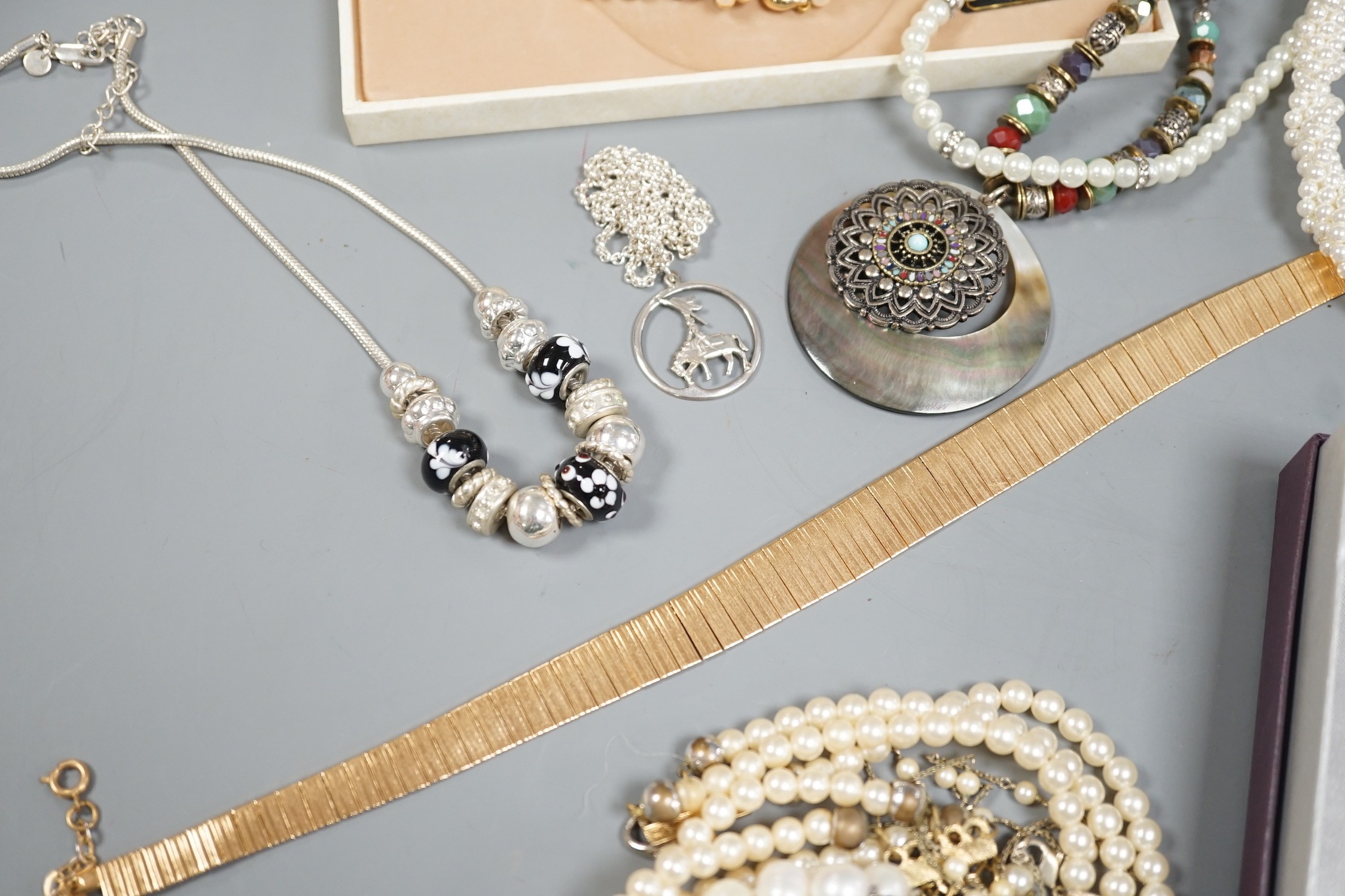 A quantity of assorted mainly modern costume jewellery and a group of coins including commemorative.